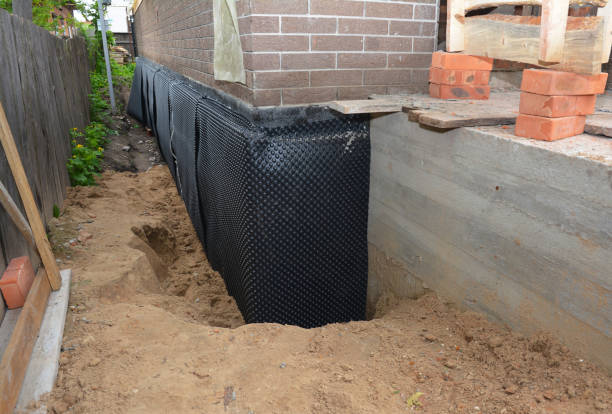 SJ Waterproofing Pros technician performing targeted Vapor Barrier Installation assessment in Sumner, MI
